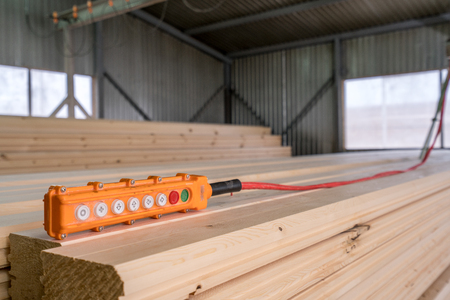 Image of remote control for crane loading timber, close-upの写真素材