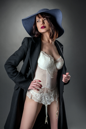 Studio portrait of pretty glamorous woman dressed sexyの写真素材