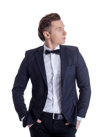 Studio photo of stylish businessman, isolated on whiteの写真素材