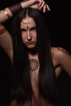 Mehndi. Portrait of young woman with exotic appearanceの写真素材