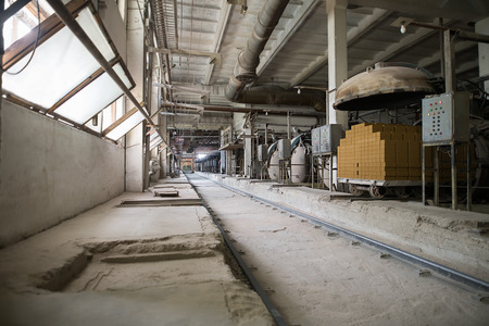 Industry. Image of old dusty workshop at brickyardの写真素材