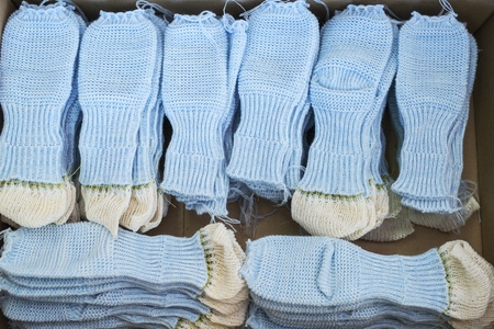 Knitted socks workpieces at knitting shopの写真素材