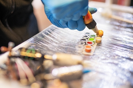 Tattoo colors on the table in a salon shot