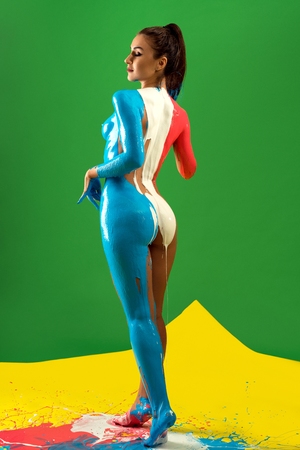 Naked girl with bodyart rearviewの写真素材