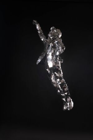 Male in fantastic mirror costumes shotの写真素材