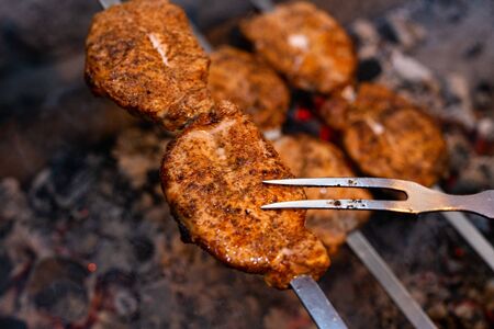 Delicious smoked meat on barbecue
