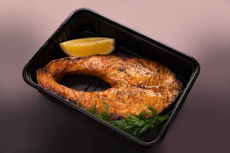 Fish steak with lemon view
