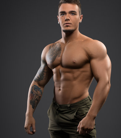 Fitness male model shirtless full-length portraitの写真素材