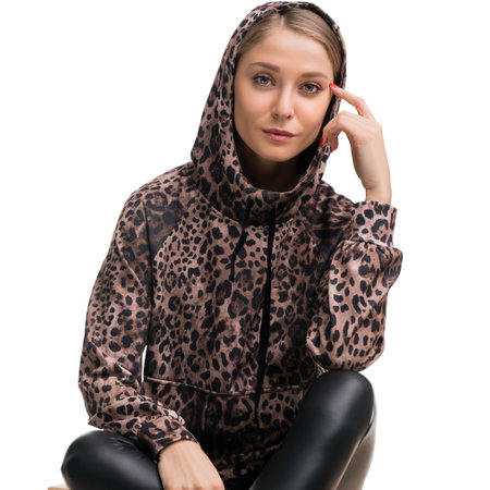 Trendy animal print hoodie worn by a model with a stylish pose indoorsの写真素材