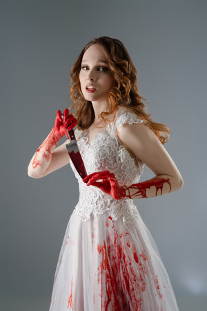 Bridal beauty with katana evokes a tale of blood and revengeの写真素材