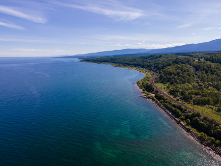 Scenic view of the coastline of Baikal lake, Russia with lush greeneryの写真素材