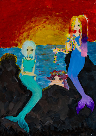 Colorful mermaid artwork by children depicting ocean scene at sunsetの写真素材