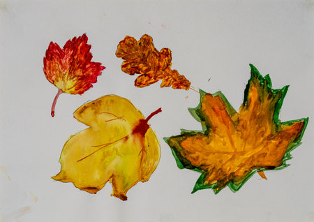 Vibrant painting of colorful autumn leaves on a white backgroundの写真素材