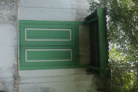 wooden window on the old houseの写真素材