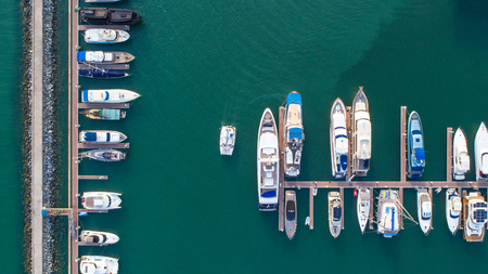 Pier speedboat. Aerial view of water transport at port harbour marinaの写真素材