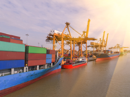 container,container ship in import export and business logistic,By crane,Trade Port , Shipping,cargo to harbor.Aerial view,Water transport,International,Shell Marine,transportation,logistic,trade,portのeditorial素材