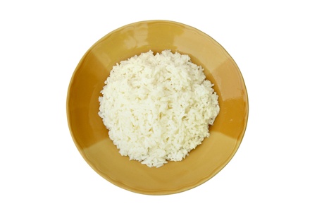 the cooked rice in brown dish on white backgroundの写真素材