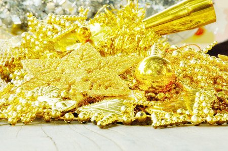 stack of gloden christmas decoration backgroundの写真素材