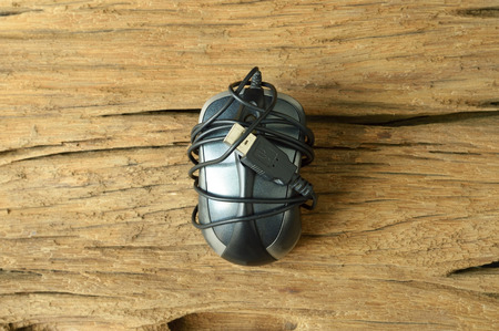 computer mouse on old wooden tableの写真素材