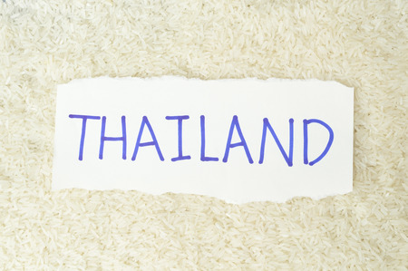 white rice background with Thailand word on paperの写真素材