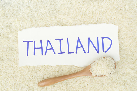 white rice background with Thailand word on paperの写真素材