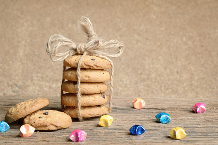 pile of chocolate chip cookie on wooden table