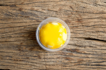 orange cake on wooden backgroundの写真素材