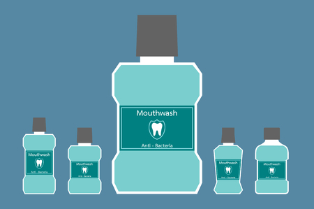 A dental cartoon vector, different bottle of mouthwash with a tooth on label isolated background. flat style illustration.のイラスト素材