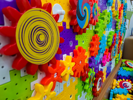 Multicolored gear for introducing the basic principles of mechanics. Educational tool or toy to improve creativity of kidsの写真素材