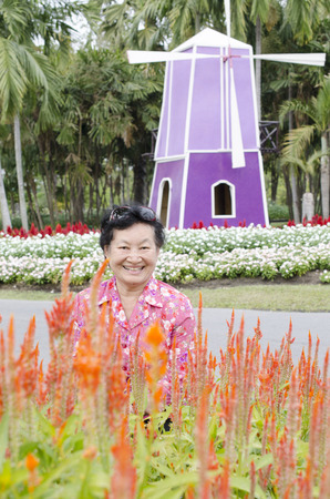 Portrait of asian elderly at the parkの写真素材