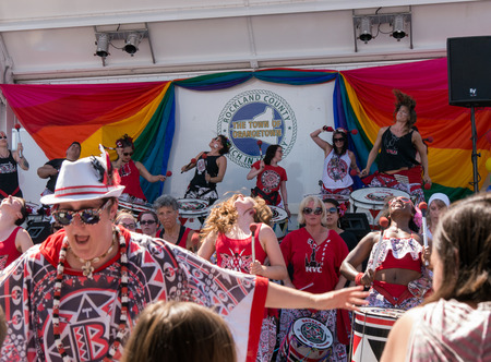 Nyack NY USA  June 14 2015: Members of Batala NYC women only band performing on and before the stage during Rockland County Pride. women only band with leader on the front performing before the stage during Rockland County Pride.のeditorial素材