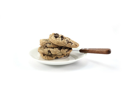 Chocolate Chip Cookies on White Plate and white backgroundの写真素材