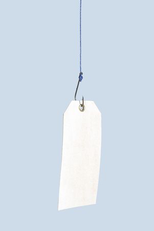 empty white pendant on metal hook labelの写真素材