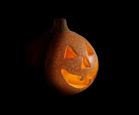 shining pumpkin helloween on black backgroundの写真素材