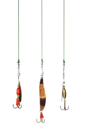 metal angling baits on white backgroundの写真素材