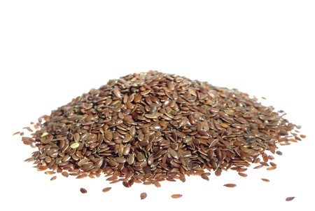 the hill from seeds of flax on white backgroundの写真素材