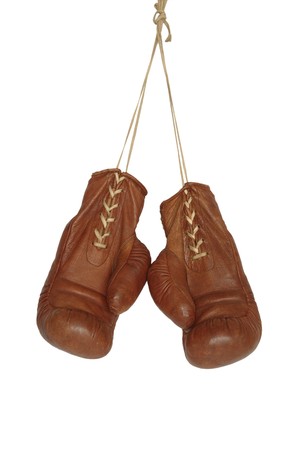 old boxing gloves on white backgroundの写真素材