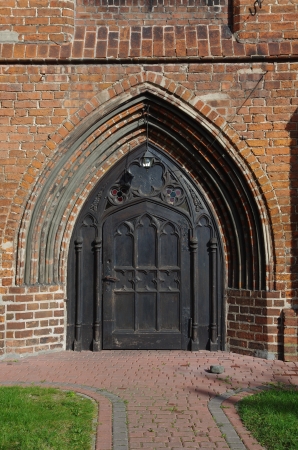 old wodden gothic gateの写真素材