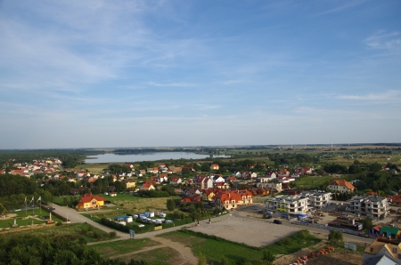 little town  over bank of lakeの写真素材