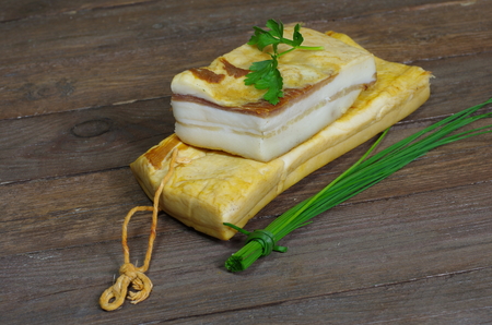 smoked speck  on board backgroundの写真素材