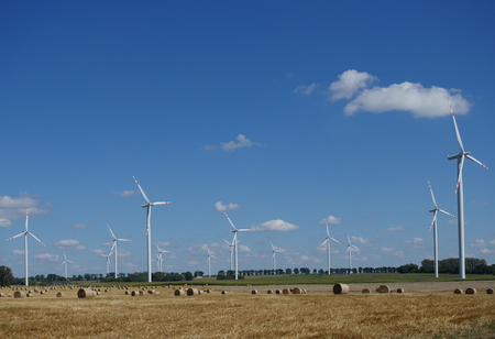 wind turbine on blue sky backgroundの写真素材