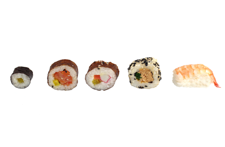  portion sushi and wooden hopsticks on plateの写真素材
