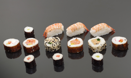  portion sushi on black plateの写真素材
