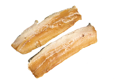 smoked fillet of herring on a white background