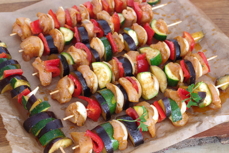 raw  tasty barbecue on baking paper  backgroundの写真素材
