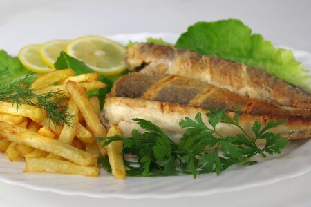fried fish with salad