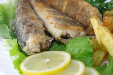 fried fish with salad