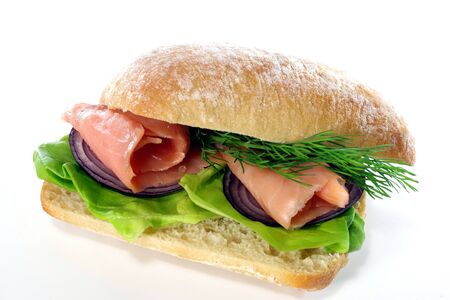 sandwich with smoked salmon on white backgroundの写真素材