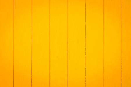 yellow wooden plank as a background or textureの写真素材