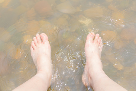 Dipping feet in water